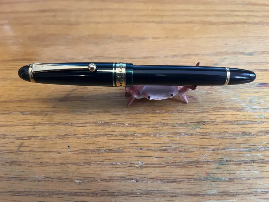 Clip up, resting on a pen crab