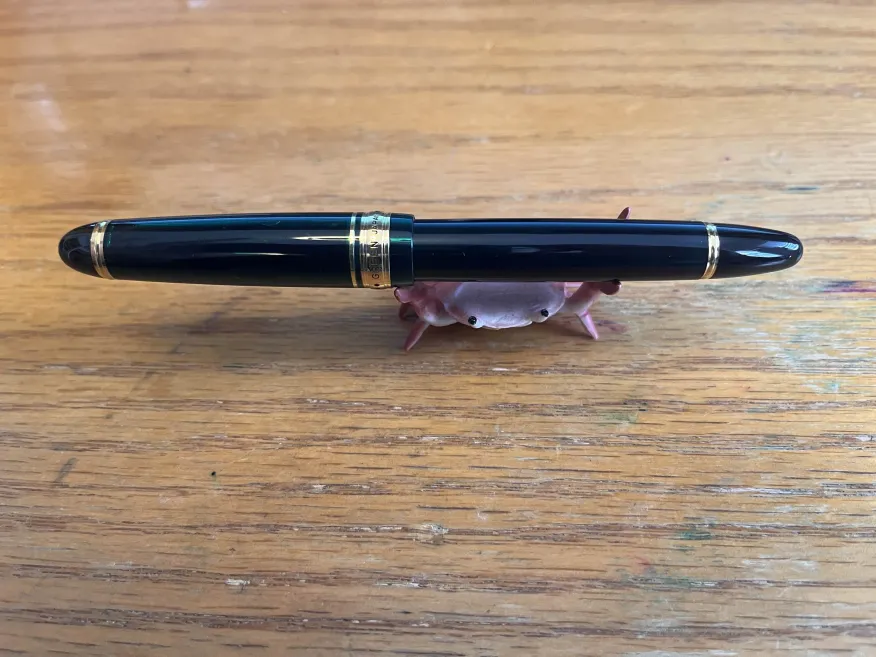 Clip down, resting on a pen crab